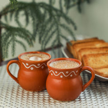 Load image into Gallery viewer, Earthen tea cups filled with tea